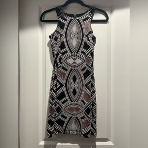 Rose gold, black, and white mini party dress. Size 1